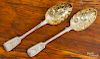 Two English silver berry spoons, 1872-1873, bearing the touch Hl Ml, and 1844-1845