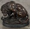 Recast bronze lion and snake sculpture, 20th c., 13'' h., 15 1/2'' w.