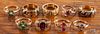 Nine unmarked gold rings, to include three hair art rings, rubies, etc., 12.6 dwt.