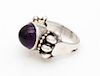* A Sterling Silver, 18 Karat Yellow Gold and Amethyst "Caviar" Ring, Steven Lagos, 8.30 dwts.