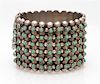 A Sterling Silver and Turquoise Dot Bangle Bracelet, Pre-1948, 49.20 dwts.
