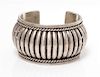 * A Sterling Silver Cuff Bracelet, Tom Charley, Navajo, 56.90 dwts.