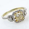 1.21 Carat Fancy Yellow Princess Cushion Cut Diamond and 18 Karat Yellow Gold Engagement Ring Accented Throughout with Approx