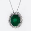 21.0 Carat Oval Cut Colombian Emerald, 4.0 Carat Round Brilliant Cut Diamond and 18 Karat White Gold Pendant Necklace.
