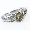 1.55 Carat Fancy Gray-greenish Yellow Round Brilliant Cut Diamond and Platinum Engagement Ring accented with .75 Carat Round 