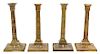 Four Mottahedeh Cast Brass Neoclassical Style Candlesticks Height 9 inches.