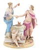 A Meissen Porcelain Figural Group Height 8 1/4 inches.