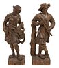 Two Carved Oak Figures Height of taller 42 1/2 inches.