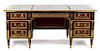 A French Empire Style Mahogany and Ormolu Writing Desk Height 31 x width 72 x depth 35 inches.