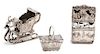 Three Continental Silver Ornaments, Possibly German, 19th Century, comprising a sleigh, a cabinet, and a basket