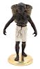 A Painted Blackamoor Figure Height 13 3/4 inches.