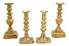 Two Pairs of Gilt Metal Candlesticks Height of largest 9 1/8 inches.