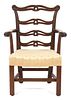 A Diminutive Chippendale Style Mahogany Open Armchair Height 26 3/4 inches.