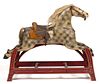 AMERICAN CARVED AND PAINTED ROCKING HORSE