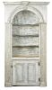 Painted pine barrelback corner cupboard, ca. 1800, retaining an old scrubbed ivory surface, 77 1/2