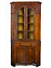 Pennsylvania curly maple two-part corner cupboard, early 19th c., 83'' h., 39 1/2'' w.