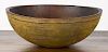 Massive turned bowl, 19th c., retaining an old mustard surface, 9'' h., 24 1/4'' dia.