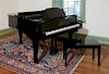 Young Chang baby grand piano with piano disc player and stool.