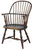 New England sackback Windsor armchair, ca. 1790, retaining an old dark varnished surface. Provenan