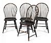 Set of four Philadelphia bowback Windsor chairs, ca. 1815, branded J. Burden, retaining old blac