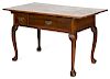 Pennsylvania walnut tavern table, 19th c., with two drawers and trifid feet, 29'' h., 51 1/2'' w., 2