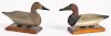 Pair of Robert McGaw carved and painted miniature canvasback duck decoys, mid 20th c., 6'' l.