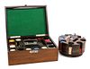 Two Mahogany Containers of Poker Chips First height 5 x width 13 x depth 9 1/2 inches.