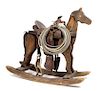 A Buck-a-Roo Style Rocking Horse Height 36 1/2 x width 14 1/2 x depth 42 3/4 inches.