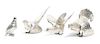 Four Silver Birds Figurines Largest height 5 3/4 x width 5 x depth 6 1/2 inches.