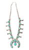 A Navajo Silver and Turquoise Squash Blossom Necklace Length 25 plus naja height 2 /14 x width 2 1/2 inches.