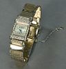 14K white gold ladies wristwatch, mesh band and square face set with 18 diamonds. total weight 41.2 grams, lg. 6 1/2in.