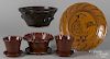 Four pieces of contemporary redware by Kohler, charger - 13 1/4'' dia., together with a Foltz milk pa