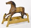 Carved and painted hobby horse, late 19th c., 36'' h., 44'' w.