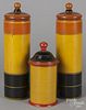 Three of turned and painted canisters, 20th c., 12 1/2'' h., 8''h