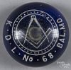Baltimore, Maryland white frit Masonic paperweight on a translucent cobalt ground, 3 1/4'' dia.