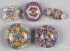 Five Chinese millefiori paperweights, ca. 1920, to include a brush rest, and a chopstick holder, lar