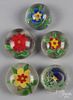 Five Chinese flower paperweights, largest - 3 1/4'' dia.