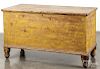 Pennsylvania painted pine blanket chest, 19th c., retaining its original yellow surface, 24 1/2'' h.,