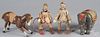 Four painted wood Schoenhut circus figures, to include two clowns, a glass eyed elephant and horse,