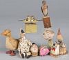 Collection of composition squeak toys, to include a duck, a clown, a recumbent dog, a bird, a pair o