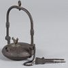 Iron fat lamp, 19th c., with brass bird finial and pick, 7 3/4'' h.