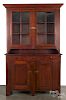 Pennsylvania stained poplar Dutch cupboard, 19th c., with tiger maple drawers, retaining an old red