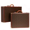 Group Louis Vuitton Monogram hard-sided suitcases