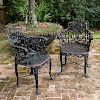 Pair Victorian cast iron lyre back armchairs