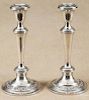 Pair of Gorham weighted sterling silver candlesticks, 9 1/4'' h., together with a sugar bowl