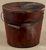 Painted pine lidded bucket, late 19th c., retaining its original red surface