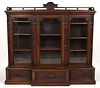 AMERICAN VICTORIAN CARVED MAHOGANY BOOKCASE
