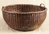 Delicately woven split oak gathering basket, ca. 1900, with bentwood handles, 7'' h., 15 1/2'' w.