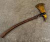 Carved and painted odd fellows parade ax, late 19th c., 33'' h.