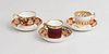 Three Assorted Porcelain Teacups and Saucers